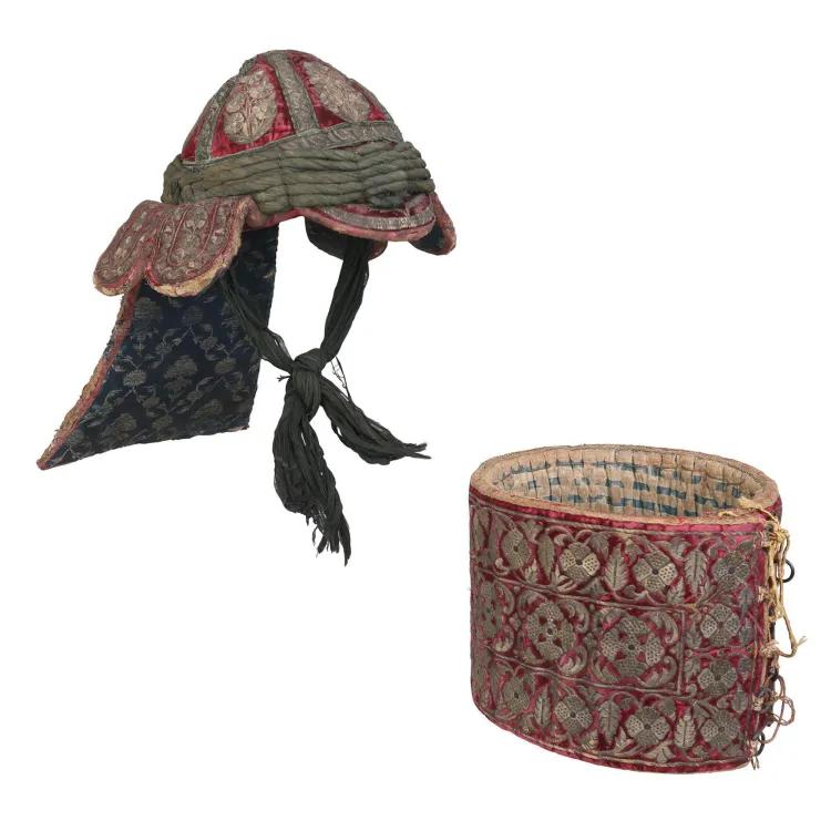 Textile armour of red and gold silk - a helmet and a torso guard