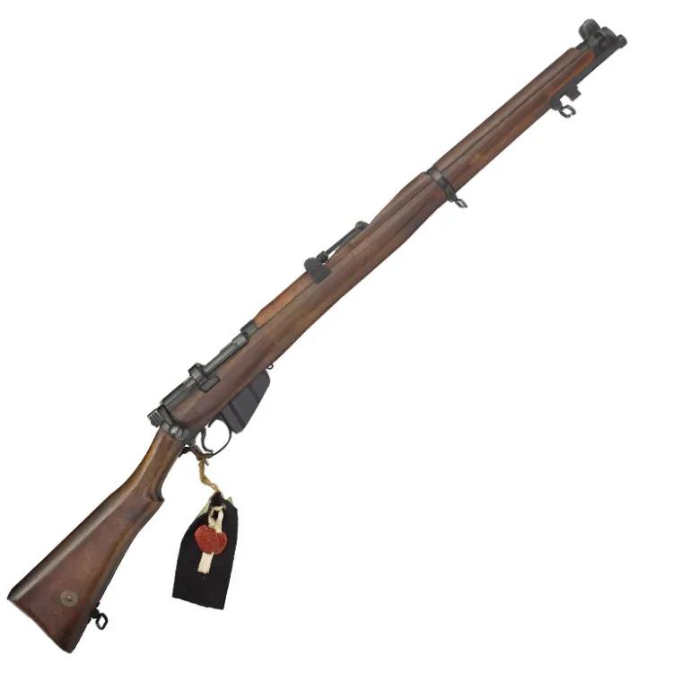 Wooden rifle with pattern tag attached