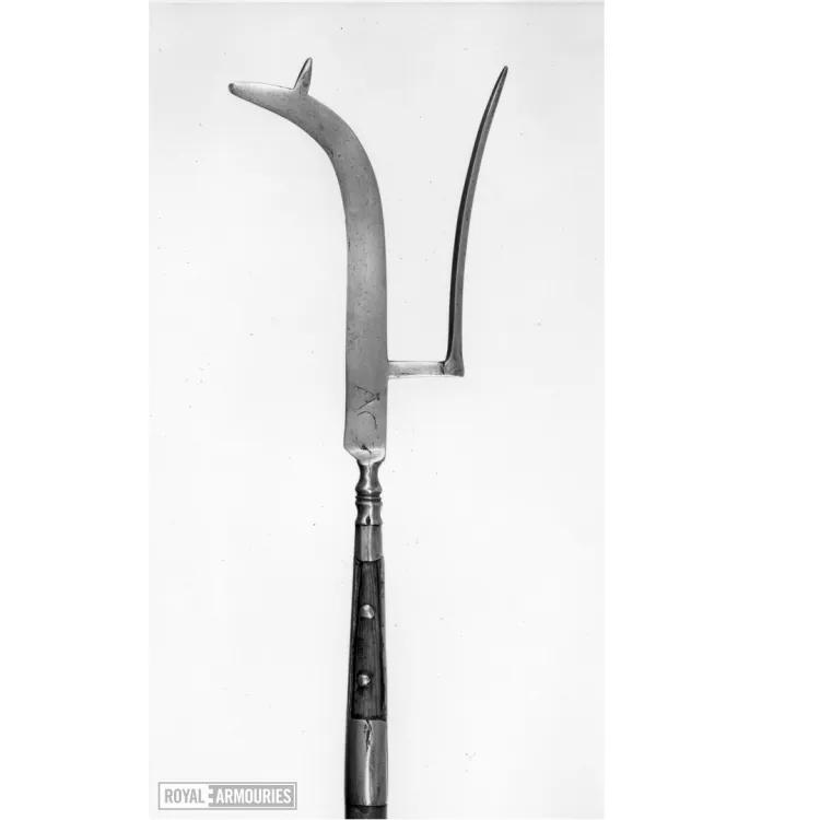 Long hook weapon with a second arm of metal curving in the opposite direction