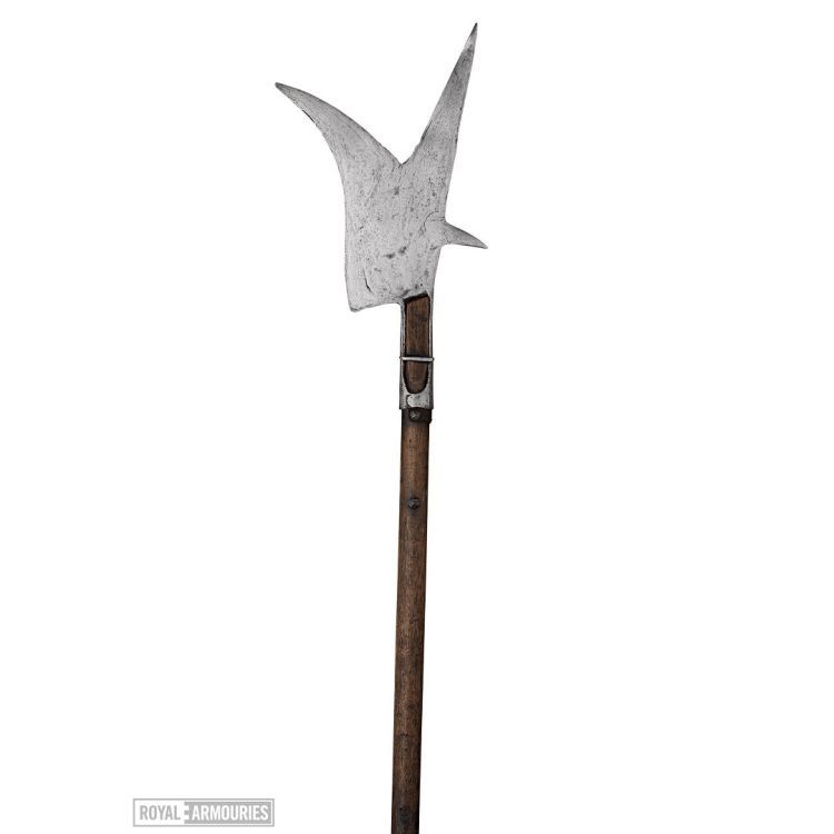Long polearm with large metal axe with 2 further pointed prongs