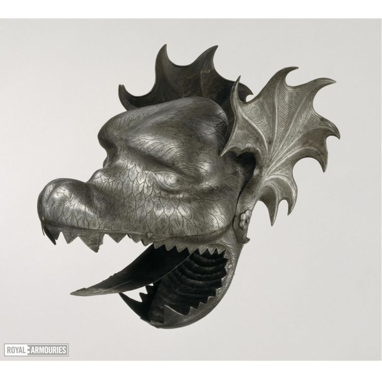 Metal dragon head, etched with decorative features