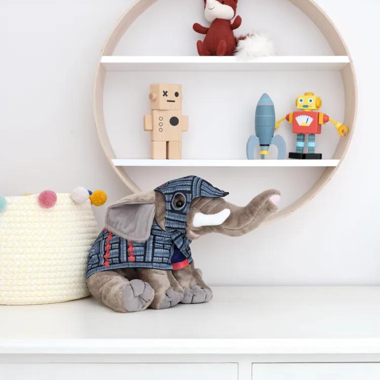 elephant armour plush toy and miscelleneous toys on shelf