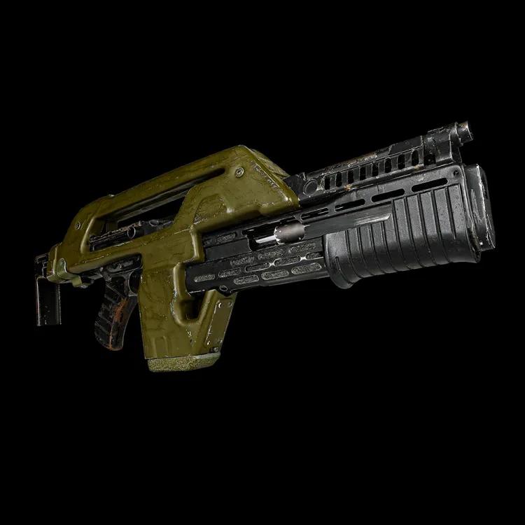 A green plastic and black rifle