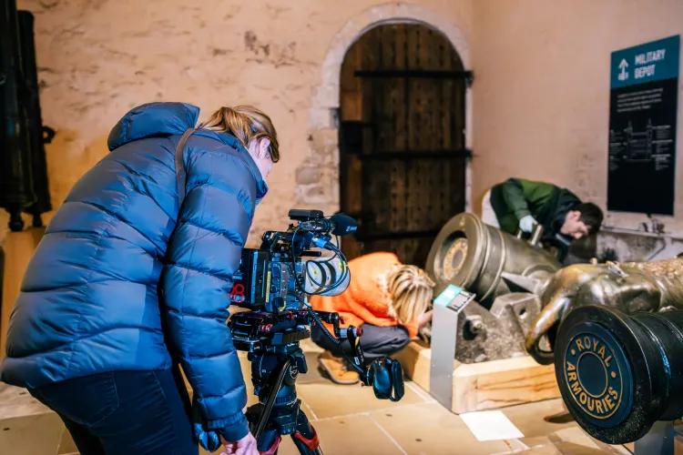 Inside the Tower filming artillery being cleaned by RA staff