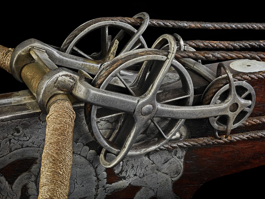 Up close intricate detail of the spanning mechanism of a target crossbow